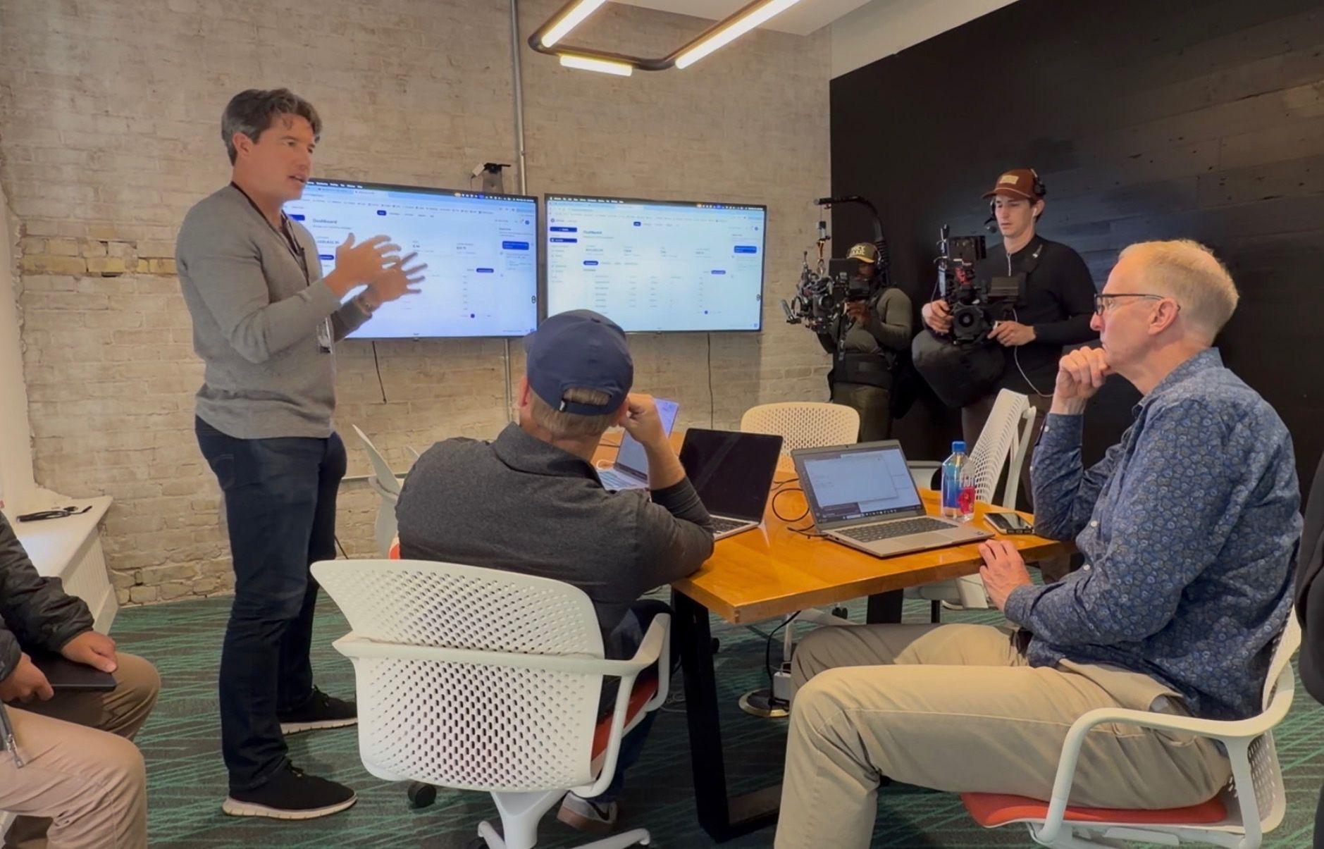 Matt presenting tech dashboards and build work at Gauntlet